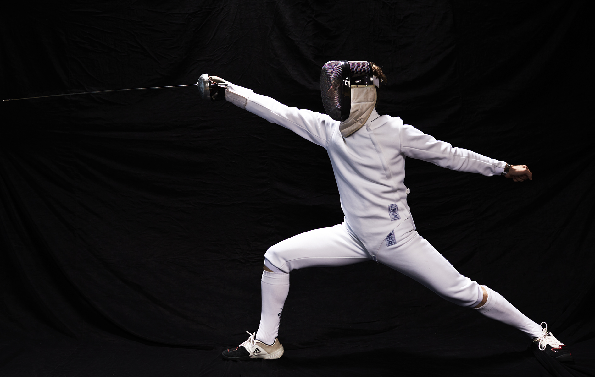 lunging fencer